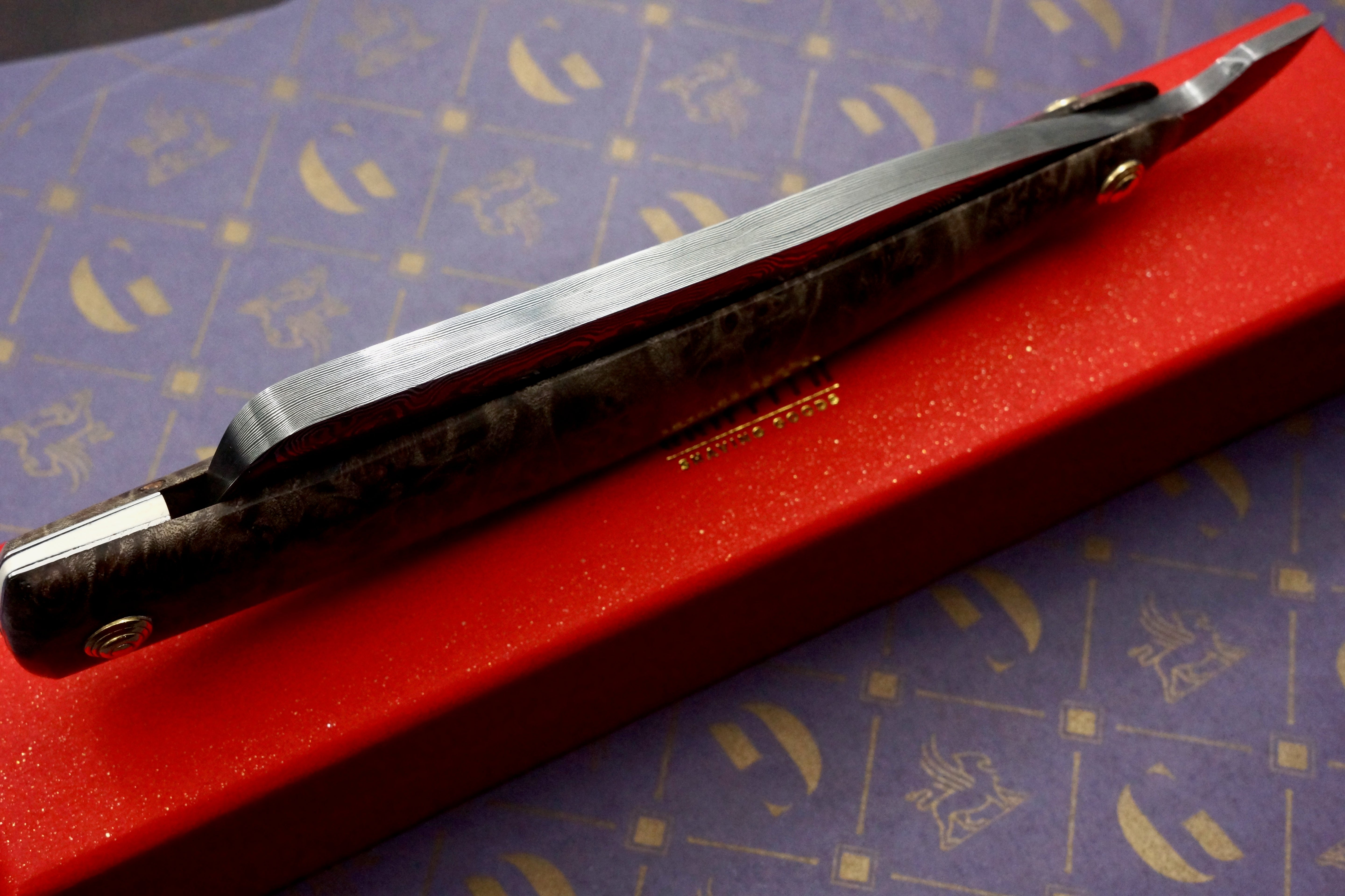 Griffith 9/8 Damascus Quarter Hollow - Amboyna Burl Scales Artisan Straight Razor