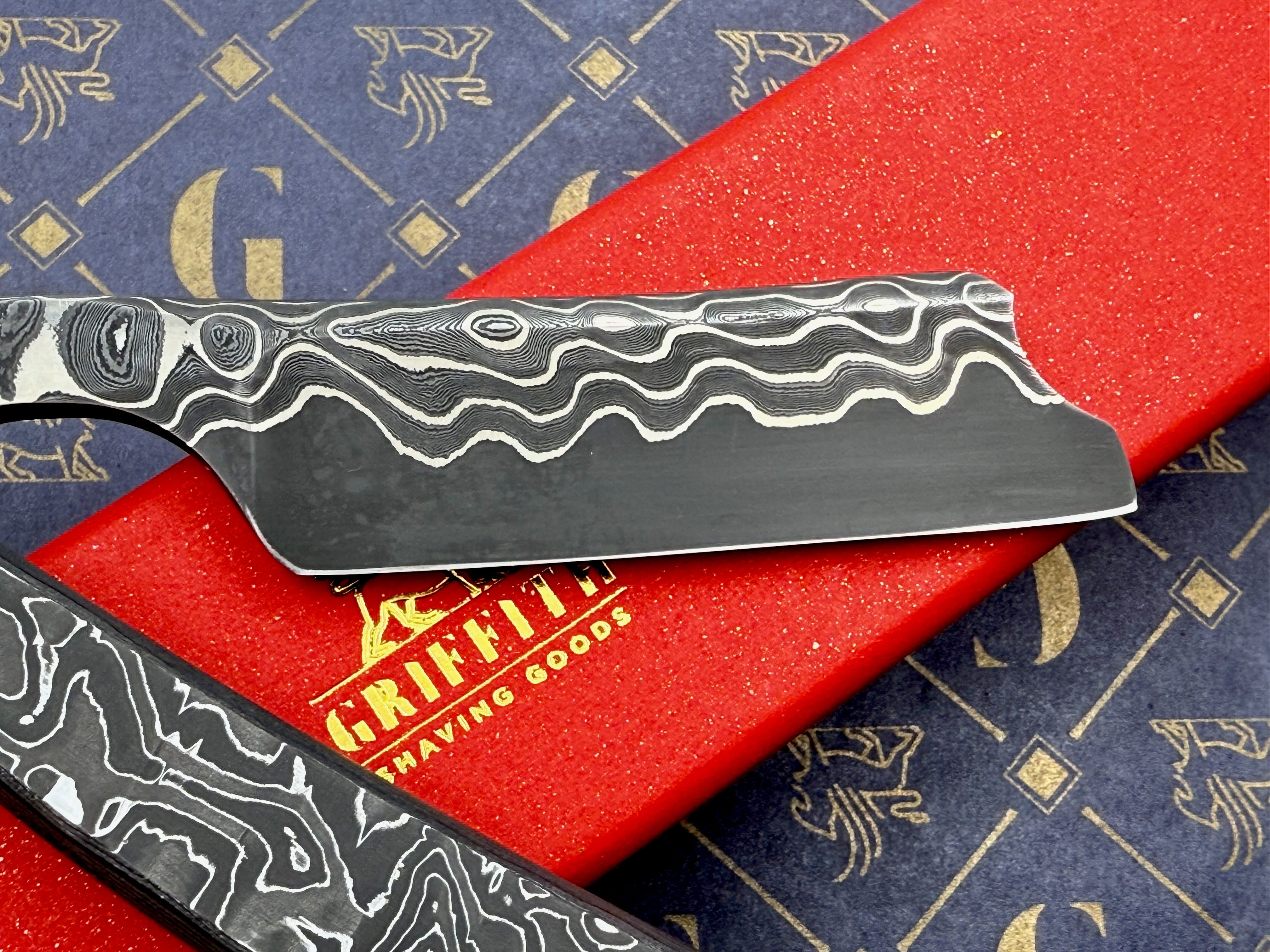 Griffith 13/16 Nickel & Steel Damascus San Mai Quarter Hollow - Carbon Scales Artisan Straight Razor