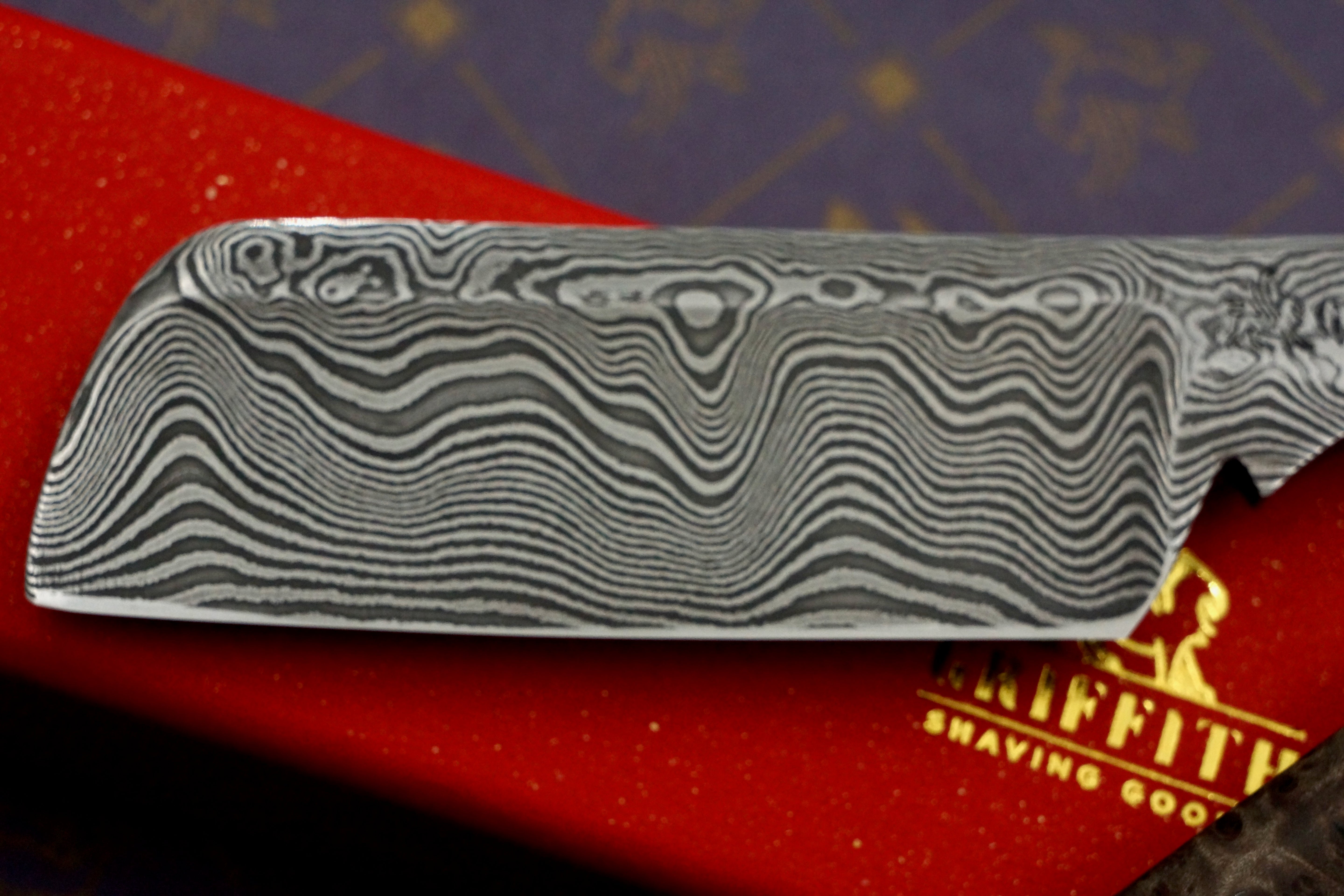 Griffith 9/8 Damascus Quarter Hollow - Amboyna Burl Scales Artisan Straight Razor