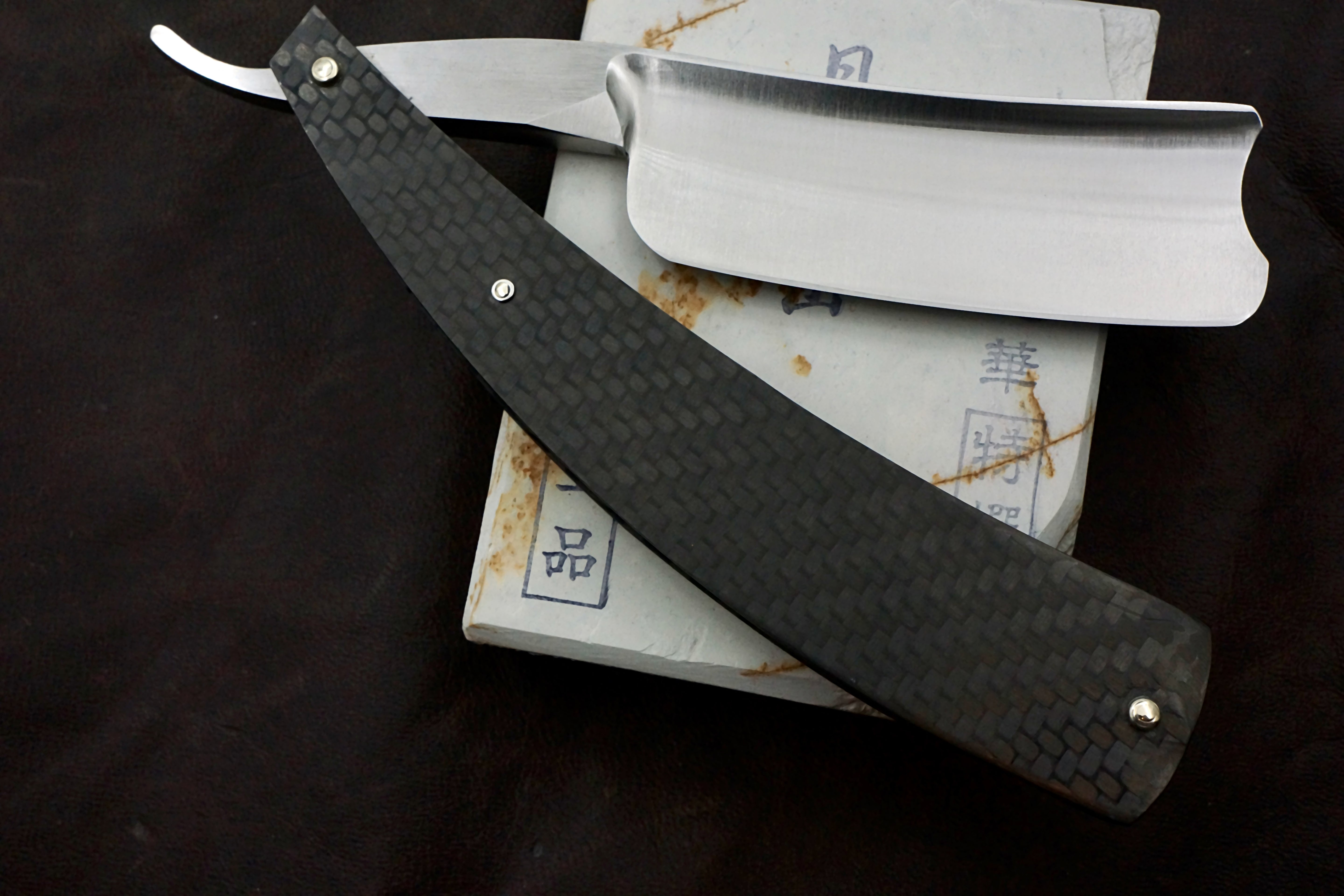 Grim Butcher 9/8 Full Hollow Blade with Carbon Fiber Scales - Preowned Straight Razor - Shave Ready