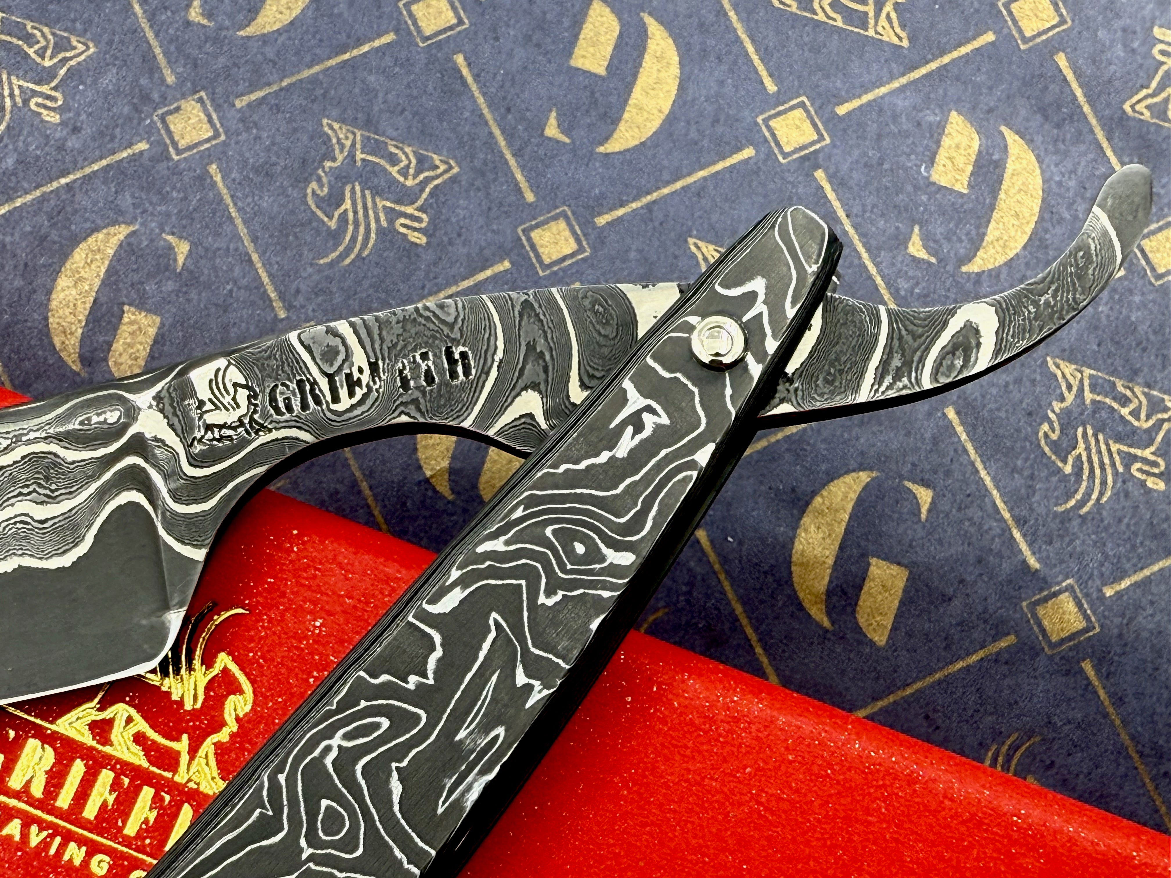 Griffith 13/16 Nickel & Steel Damascus San Mai Quarter Hollow - Carbon Scales Artisan Straight Razor